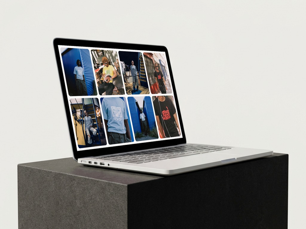 Laptop on a black block showing photos of REIER